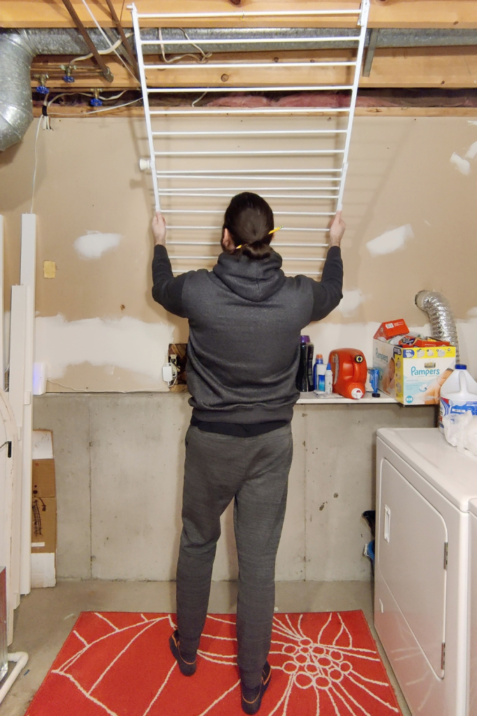 position clothes drying rack