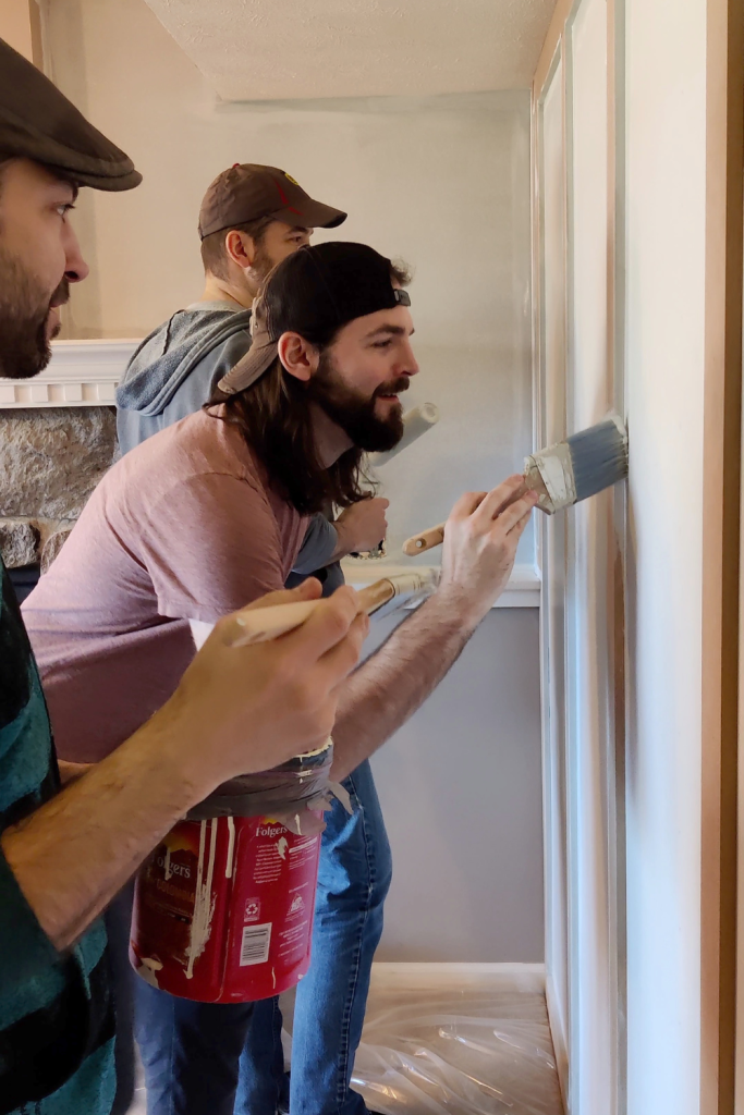 friends painting a room